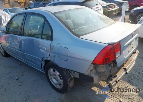 2004 Honda Civic Hybrid from USA, damaged, VIN JHMES96694S017503